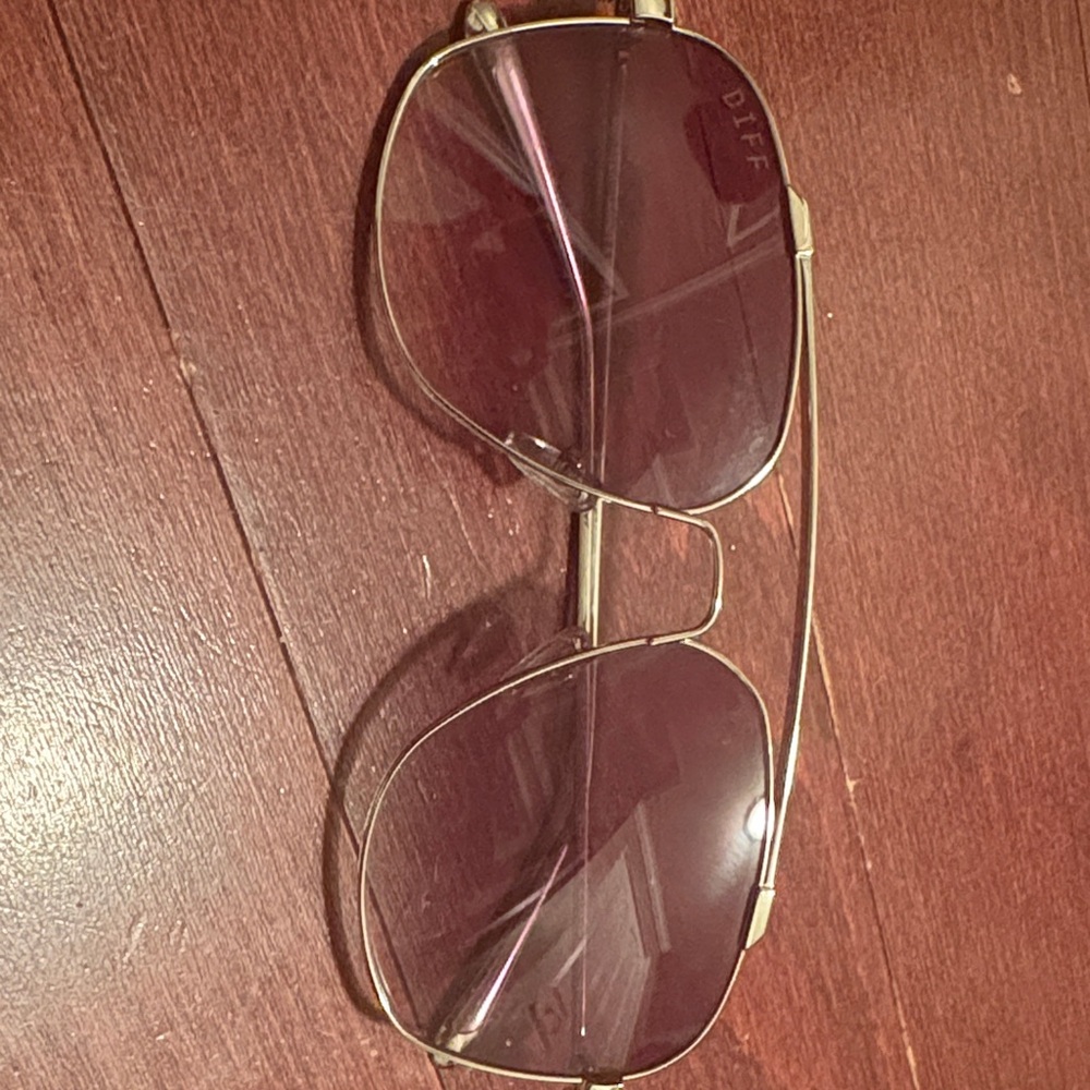 Unisex silver glasses with greyish lens like new